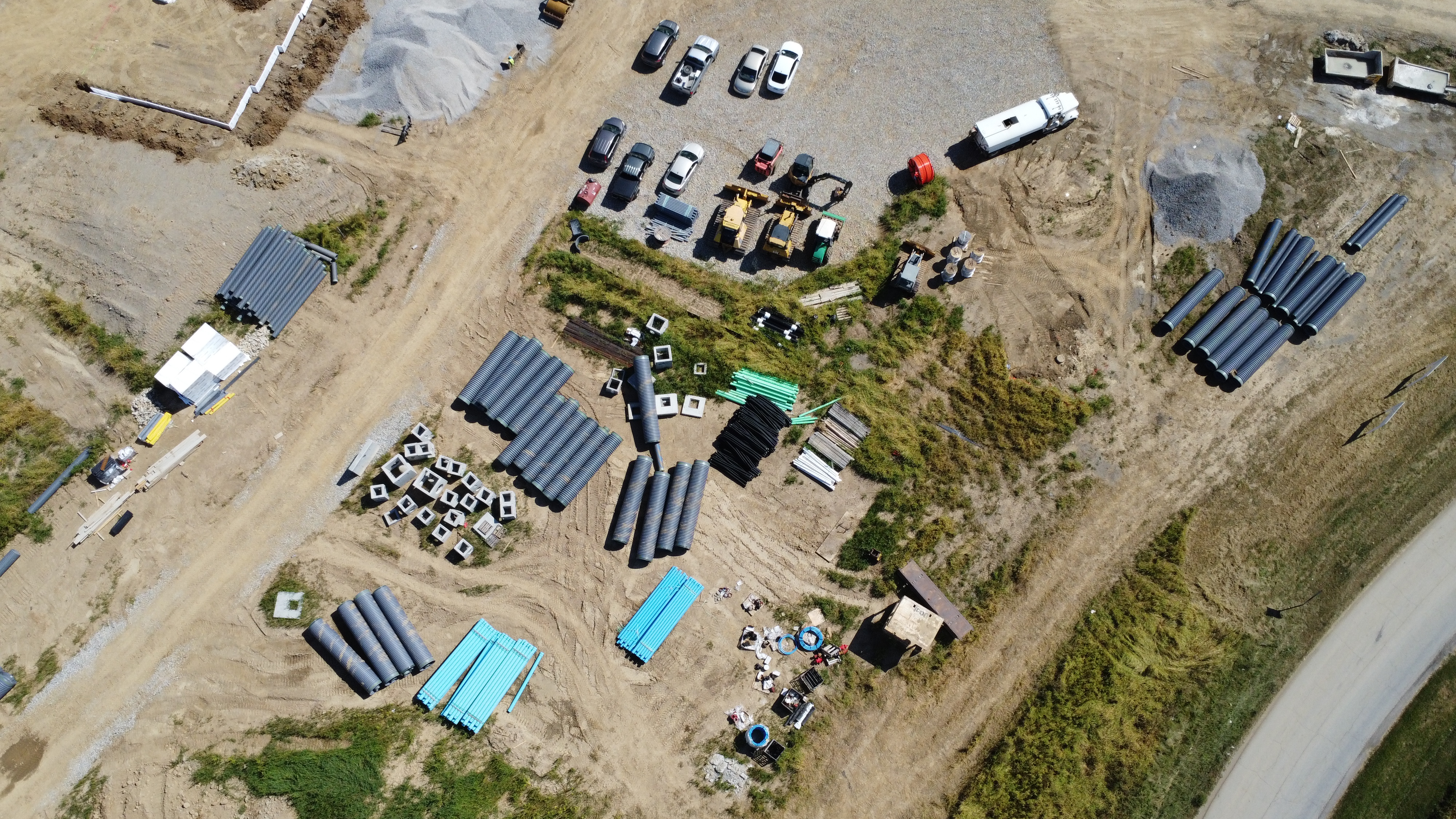 Construction progress aerial view of an active job site.